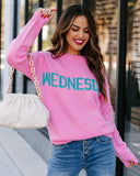 Wednesday Wearing Pink Knit Sweater