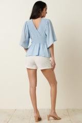 Mittoshop R.S.V.P. Full Size Run Flare Sleeve Peplum Blouse in Blue Ins Street